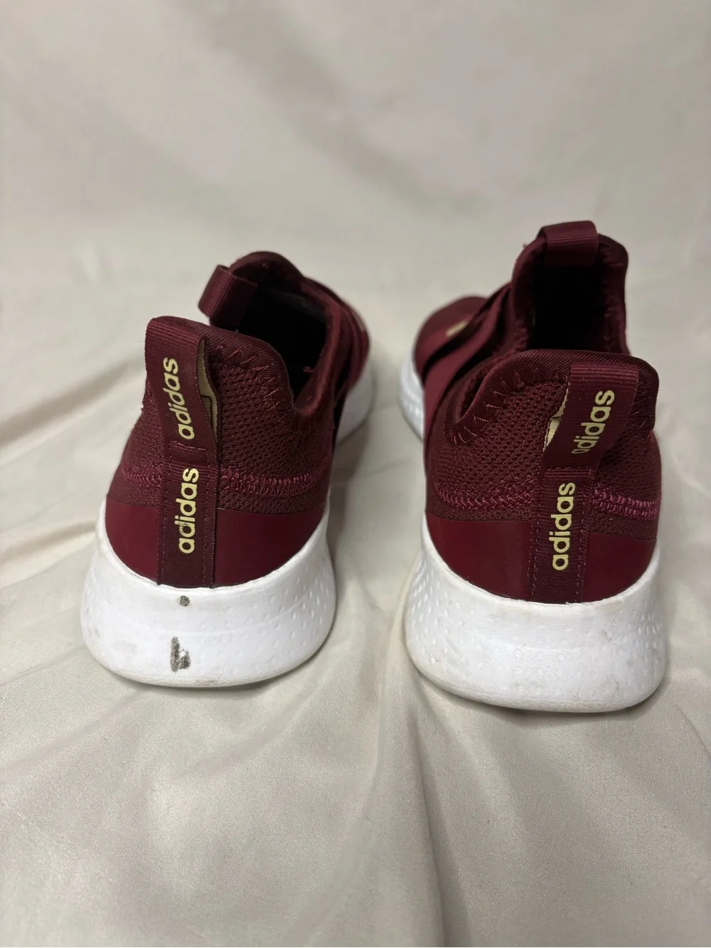 adidas woman’s burgundy sneakers